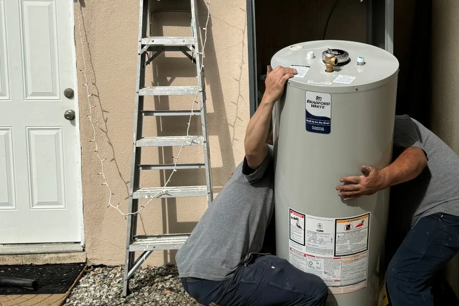 cypress air technicians installing water heater