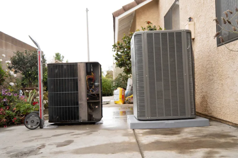 new AC unit installed, old ac on dolly cart